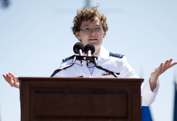 Coast Guard Ens. Christine Groves delivers a speech at the Coast Guard Academy during the 142nd Commencement Exercises May 17, 2023. Groves was the Distinguished Honor Graduate for the Class of 2023. (U.S. Coast Guard photo by Petty Officer 2nd Class Matthew Abban).