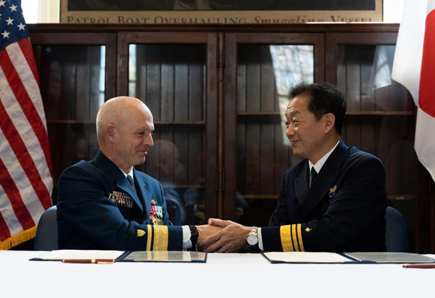 U.S. Coast Guard Rear Adm. Bill Kelly, superintendent of the U.S. Coast Guard Academy, and Japan Rear Adm. Mitsuru Eguchi, supertintendent of the Japan Coast Guard Academy, meet in New London, Conn., April 21, 2023. (Matthew Abban/U.S. Coast Guard)