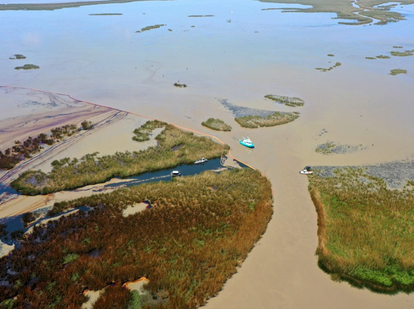 An overflight displays the affected area of marsh environment near Garden Island Bay, Louisiana