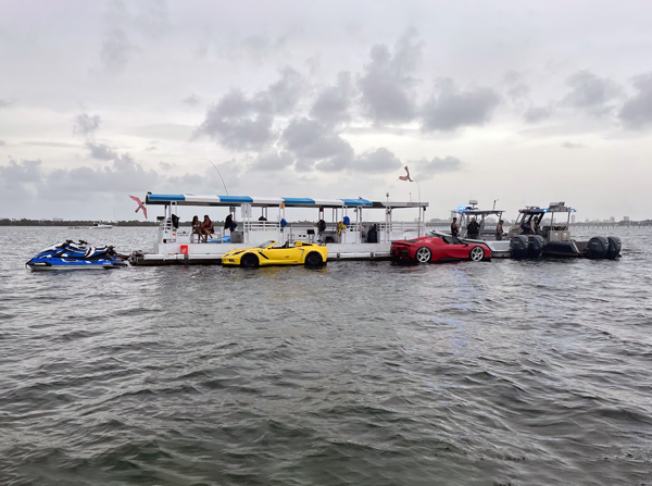 A U.S. Coast Guard Sector Miami boarding team terminates the voyage of an illegal charter, Mothership, near Julia Tuttle Causeway in Miami, June 27, 2025. The Mothership, cited for failure to have a drug and alcohol program, was issued a Captain of the Port order preventing commercial vessel operations. (U.S. Coast Guard photo)
