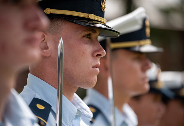 Coast Guard Academy stand in formation during a change of watch ceremony at the Coast Guard Academy, August 20, 2024. The ceremony marks the transition of the summer leadership team to the fall semester command. (U.S. Coast Guard photograph by Petty Officer 3rd Class Matt Thieme)