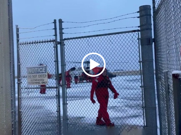 A Coast Guard MH-60 Jayhawk helicopter aircrew from Forward Operating Site Cold Bay transports 9 commercial fishing vessel crewmembers from a downed aircraft near St. George, Alaska, Jan. 5, 2026. The crewmembers were transferred to emergency medical services with no reported injuries. (U.S. Coast Guard video courtesy of Matthew Mandregan)
